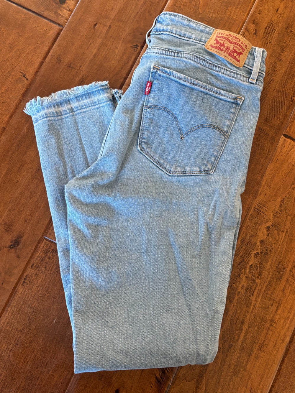 Levi’s 711 skinny w/ frayed hem